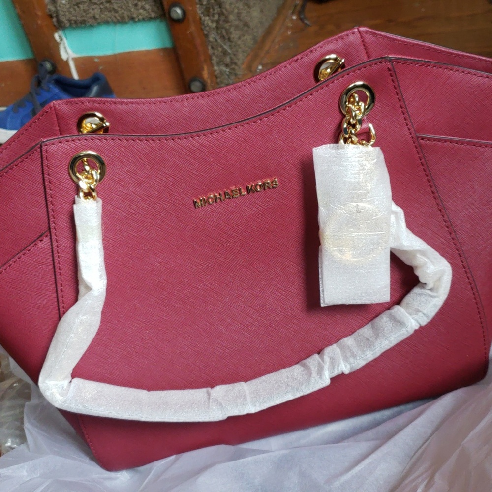 Sold Red leather sholder purses